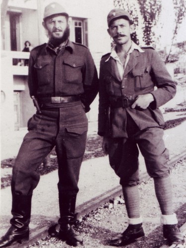 Yussuroum (right) with a fellow Greek soldier fighting the Nazis during World War II. He used the Christian name "Yiorgos Gazis" in case the Nazis captured him.